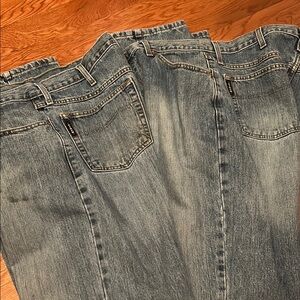 Two Pairs of Cinch Jeans
